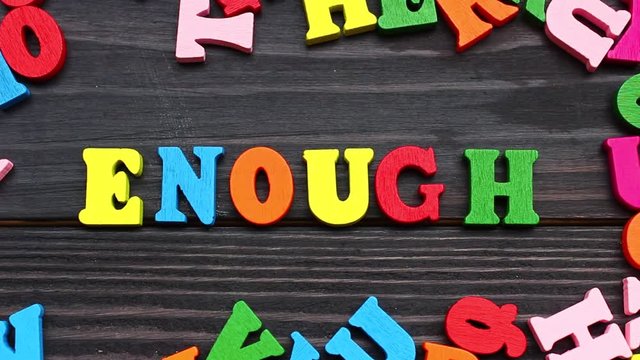 The word enough with colored letters