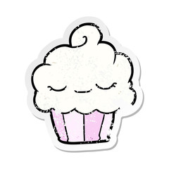 distressed sticker of a cartoon cupcake