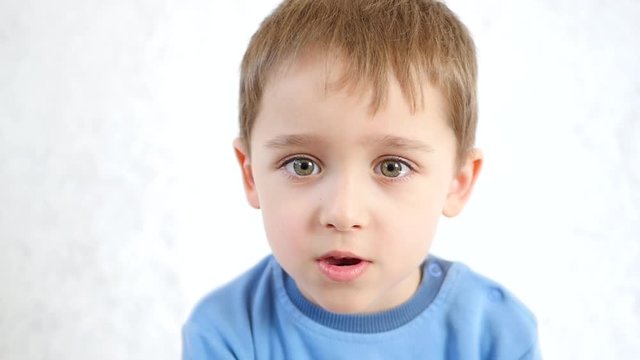 Portrait of a thoughtful child, on a white background
