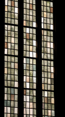 Graphic detail of stained glass church windows enlightend by daylight.
