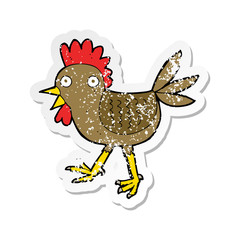 retro distressed sticker of a funny cartoon chicken