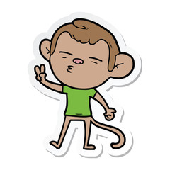 sticker of a cartoon suspicious monkey