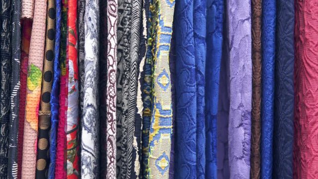 Drapery. Hundreds of different fabrics. Selection of various color options, camera movement along fabrics