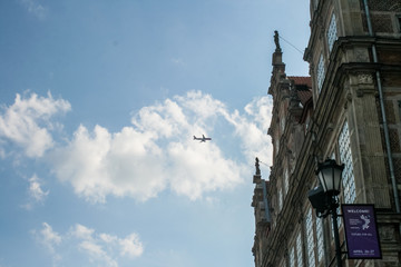 the facade of the old modern house and plane