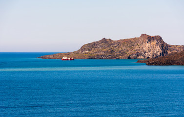 ship enters the bay of Thira (Santorini)