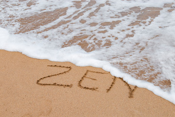 zen écrit sur le sable