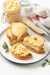 Chicken pate with carrots on toast bread, delicious spread for Breakfast. Healthy food, vegetable snack, wine aperitizer