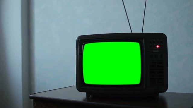 Old 80s TV with Green Screen. Night Watch