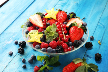 salad with fresh fruits and berries. healthy spring fruit salad  with strawberries