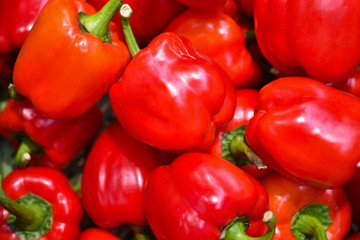 Background cut red sweet pepper in a basket