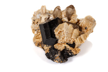 macro mineral stone schorl, black tourmaline on white background