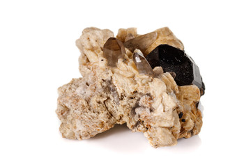 macro mineral stone schorl, black tourmaline on white background