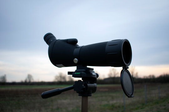 Spotting scope on a tripod.