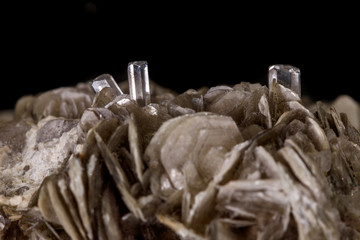 macro mineral stone Topaz on a black background