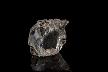 macro mineral stone Topaz on a black background