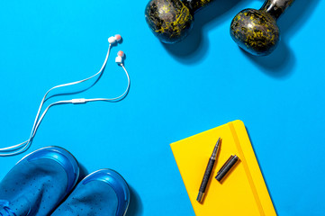 Sports and fitness equipment flat lay.