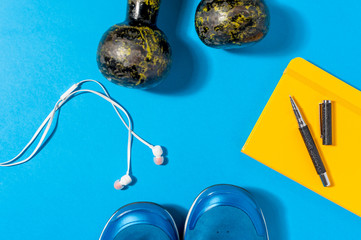 Sports and fitness equipment flat lay.