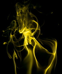 Yellow smoke on black background