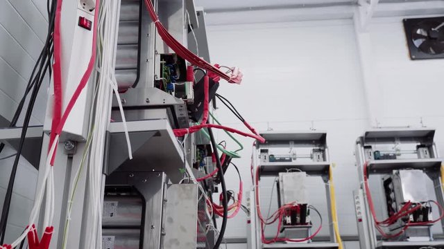 Test benches in the laboratory for the production of microprocessor-based protection and automation devices.