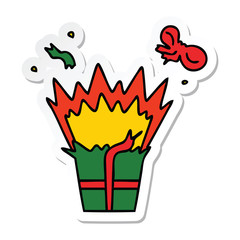 sticker of a quirky hand drawn cartoon of an explosive present