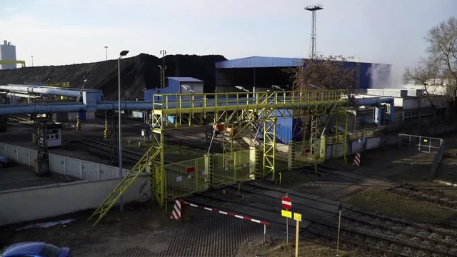 Dark downtown of Elektrocieplownia Zeran power plant railway track, on a cold evening