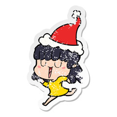 distressed sticker cartoon of a woman wearing santa hat