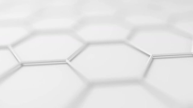 Abstract animation of futuristic surface with hexagons, 3d render, sci-fi background design with bokeh effect, 4k seamless looped video