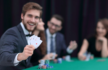 player to the casino with a combination of four aces.