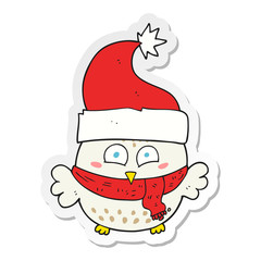 sticker of a cartoon owl wearing christmas hat