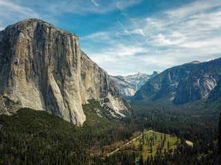 Yosemite National Park. El Capitan and Yosemite Valley, and Yosemite Falls, Aerial View, Blue Sky with Beautiful Clouds