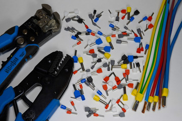 Tools and materials for stripping and crimping the tips of stranded electrical wires
