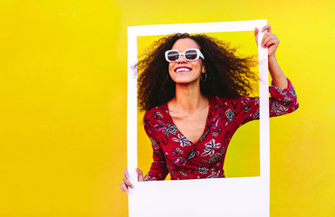 Beautiful female with big picture frame