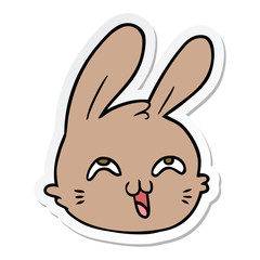 sticker of a cartoon happy rabbit face