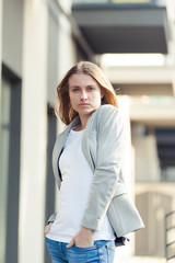 Portrait of beautiful smiling blonde young woman 