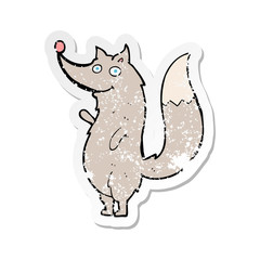 retro distressed sticker of a cartoon waving wolf