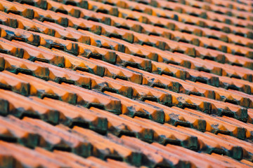 Old Red Ceramic Roof Tiles Background. Old pitched roof