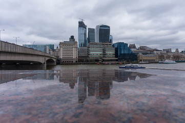 A view across the River Thames from City Hall, London, UK towards the City of London