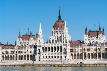Hungarian Parliament Building in Budapest with Danube river in foreground - Budapest, Hungary