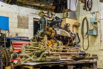 car engine repair in old service, removed engine from car