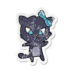 distressed sticker of a cartoon cat