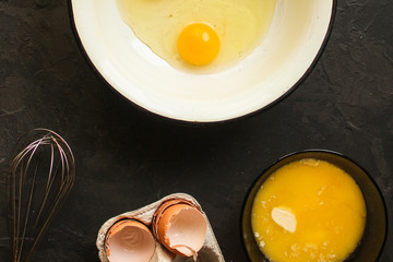 raw dough mix ingredients (eggs, flour and others). food background. copy space