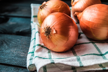Raw onions on a table
