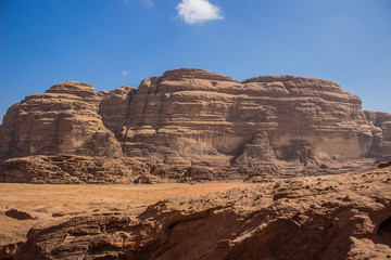 Fototapeta na wymiar Wadi Rum Jordan Middle East country rocky desert scenery environment landscape heritage place with steep bare mountain ridge background, picturesque panorama touristic photography 