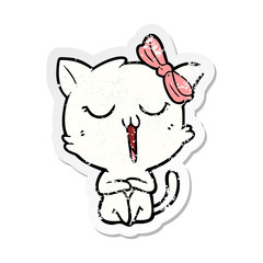 distressed sticker of a cartoon cat