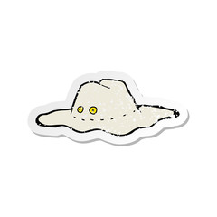 retro distressed sticker of a cartoon old australian hat