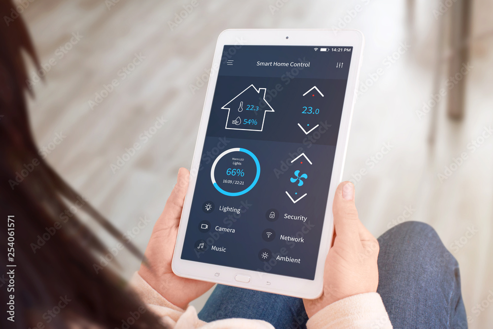 Poster smart home control app on tablet display. close-up.
