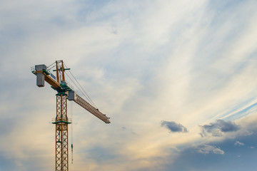 silhouette crane construction site on sunset time background
