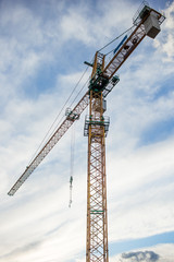 silhouette crane construction site on sunset time background