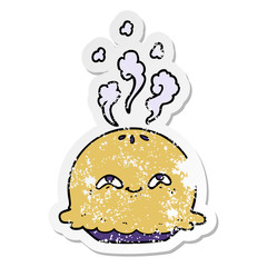 distressed sticker of a cartoon pie