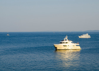 Fototapeta na wymiar Yacht is stending in the sea near Corfu island